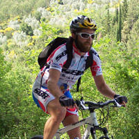 Ritratto di Gianluca Scafuro in bicicletta